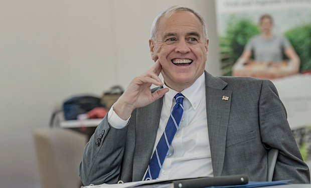 Comptroller DiNapoli smiles at a community engagement event